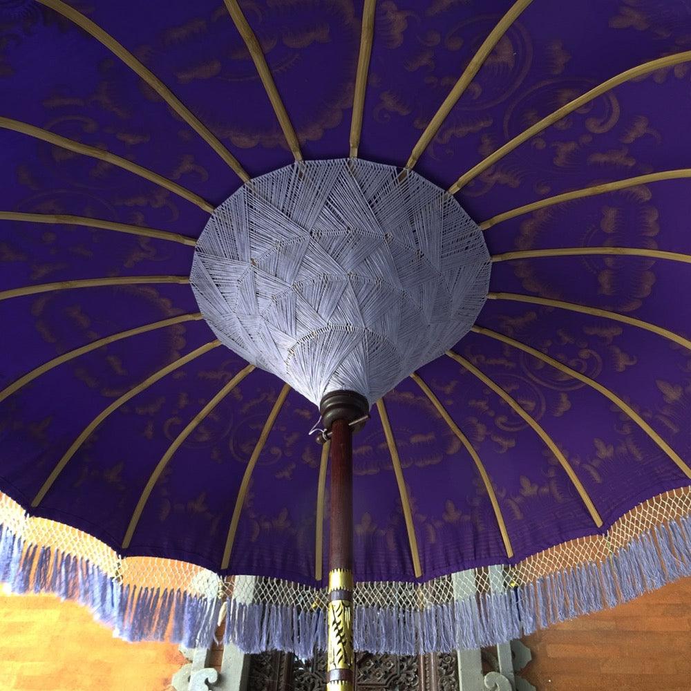 Underside view of Claudia Parasol revealing lilac inner threading and bamboo spokes.